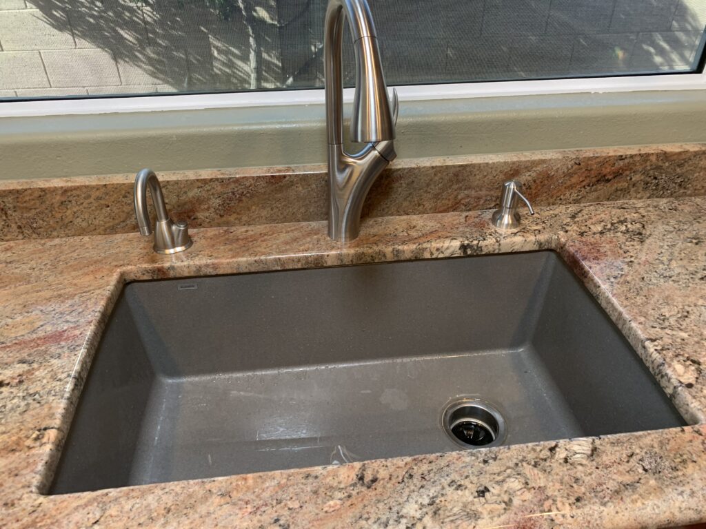 New kitchen faucet hot water dispenser and disposal in Saddlebrooke Arizona